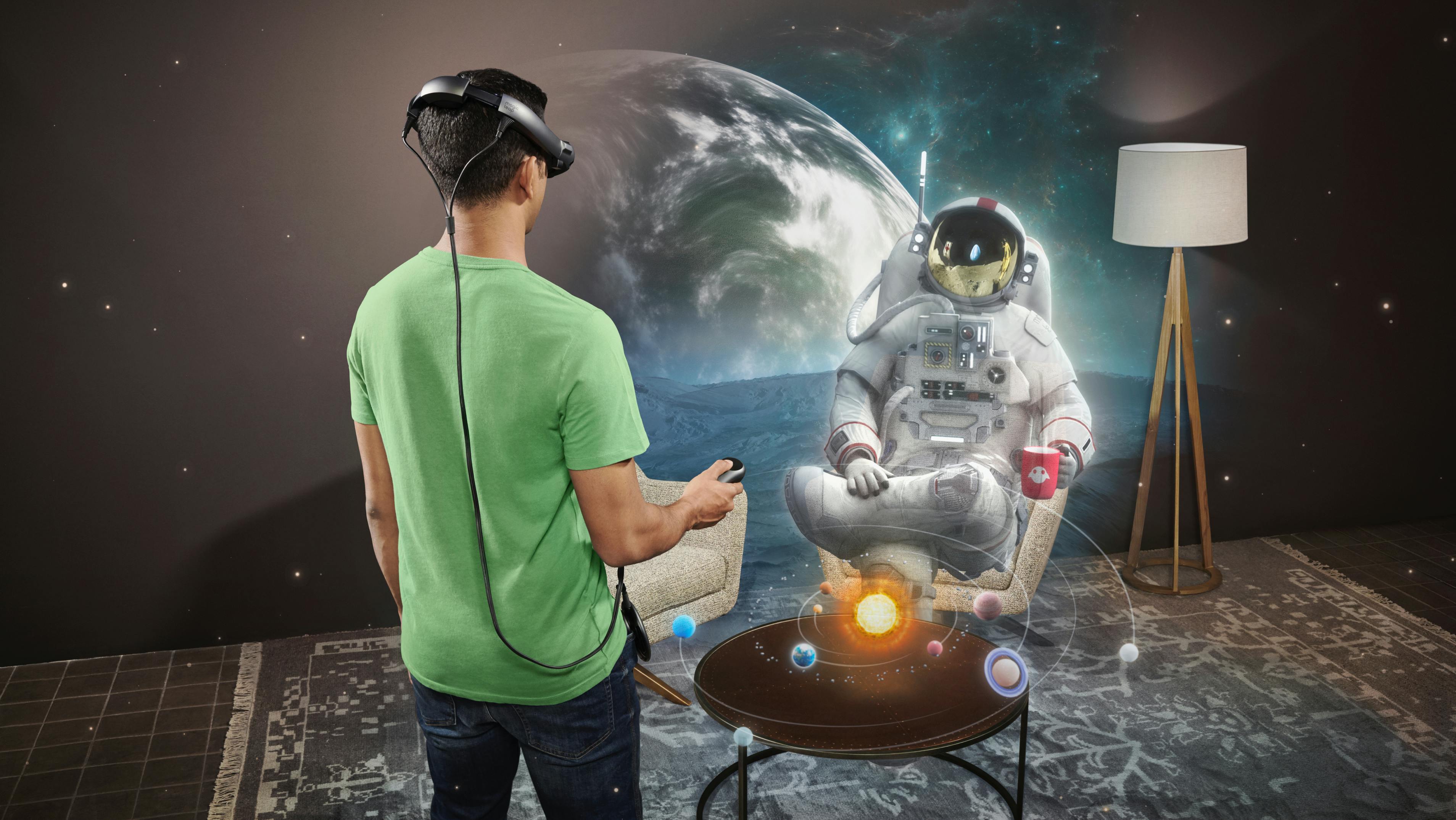 Using Magic Leap 1 to see an astronaut sitting on the couch drinking tea.